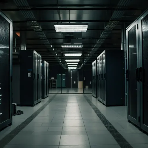 High-security data centre with server racks and clean, well-maintained flooring, showcasing professional data centre cleaning.