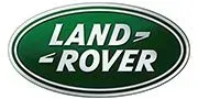 Luxury Car Dealership Exterior Cleaning: Keeping Range Rover Showrooms Spotless Range Rover dealership building undergoing professional exterior cleaning with high-pressure washing for a pristine look.