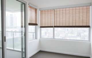 Sydney apartment with balcony, venetian blinds, and large windows requiring specialized cleaning services